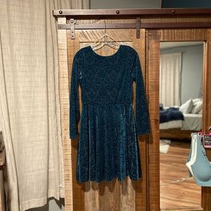 Large, turquoise homecoming dress. I’m 5’2, 115 pounds for reference